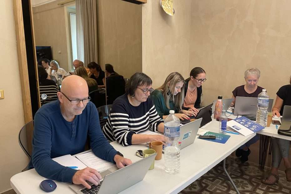 Teachers working on laptops side by side during an ELA training course on ICT and new technologies